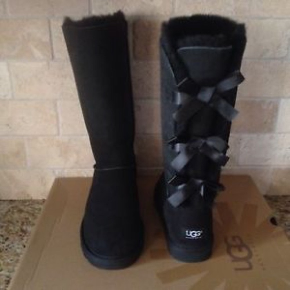 Black bow tall uggs